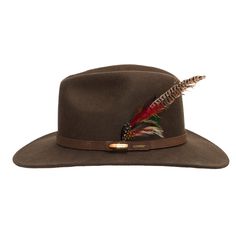 The Freedom Western Cowboy hat is a crushable genuine Australian wool felt fedora with a tall blocked center dent crown. This hat features an authentic leather hatband, a wide brim, two cowboy pins on each side, real exotic feathers, and a breathable sweatband. The brim contains a wire to hold its shape. Prepare yourself to stand out from the rest with this design. The Freedom is perfect for any occasion since its design is classic, very flexible, and will improve any outfit. Featuring unique de Western Style Brown Fedora With Flat Crown, Western Brown Fedora With Flat Crown, Country Style Felt Hat With Curved Brim For Hunting, Western Brown Fur Felt Hat, Classic Brown Felt Hunting Hat, Brown Fur Felt Fedora For Ranch, Brown Fur Felt Hat Band For Ranch, Fur Felt Hat For Fall Rodeo, Country Style Fur Felt Hat With Flat Brim