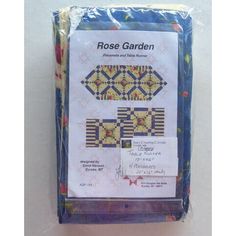 the package is packaged in plastic and has an image of a rose garden on it