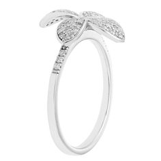 Accessorize with style when you wear this sparkling diamond sterling silver flower ring. Accessorize with style when you wear this sparkling diamond sterling silver flower ring.Click on this JEWELRY & WATCHES GUIDE to learn about fit, styles, materials and more! Nickel free Metal: sterling silver Packaging: boxed Plating: rhodium Width: 10 mm Finish: polishedDIAMOND DETAILS Total weight: 1/4 ct. Color grade: H Clarity: 11 Shape: round brilliant Setting: micro pave Diamond weights are approximate Diamond Flower Ring With Diamond Accents, Flower Shaped Diamond White Ring With Diamond Accents, Diamond White Flower-shaped Ring With Diamond Accents, White Diamond Flower-shaped Ring With Accents, White Gold Diamond Ring With Flower Accents, White Gold Diamond Ring With Flower Shape, Diamond White Flower Shaped Diamond Ring, Fine Jewelry Diamond Ring In Flower Shape, Fine Jewelry Diamond Ring In Flower Design