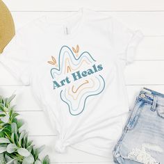 Artist Gift Shirt, Art Quote T-Shirt, Artist Shirt, Art Teacher Gift, Art Lover Tee, Art Line Art Top, Gift for Her, Motivational Tee https://www.etsy.com/listing/1225517423/artist-gift-shirt-art-quote-t-shirt?utm_source=crowdfire&utm_medium=api&utm_campaign=api Artistic Shirt With Custom Print, Artsy Custom Artwork T-shirt For Summer, Artistic Custom Artwork T-shirt For Summer, Funny Art Teacher Shirts, Art Teacher Tshirt, 2023 Board, Art Top, Art Teacher Gifts, Artist Shirts