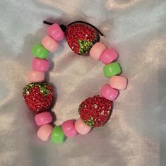 Handmade Kandi Bracelet With Strawberries Would Best Fit A Small Or Xs Wrist. Scene Bracelets, Strawberry Bracelet, Scene Kandi, Shifting Script, Rave Scene, Kandi Ideas, Kandi Cuff, Kandi Bracelets, Pink Bracelet