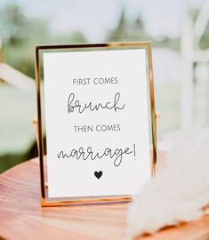 a sign that says first comes branch then comes marriage on top of a wooden table