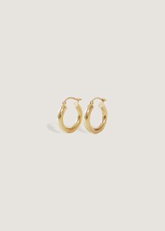 Your favorite oversized hoops. Wear them day to night, with jeans and a white tee or a power pant suit. We made them easy to put on (trust us, we've tried on every hoop!) and hollow, so they won't weigh you down.Complete the look with our Pavé Hoop Huggie Earrings. Hinged back closure. 14k solid gold—always Weight: 0.5g per earring Measurements: 3x15mm Minimalist Polished Finish Hoop Earrings For Everyday Luxury, Minimalist 14k Gold Huggie Earrings With Shiny Finish, Small Hoop Minimalist Earrings For Everyday Luxury, Classic Tarnish Resistant 14k Gold Huggie Earrings, Classic 14k Gold Tarnish Resistant Huggie Earrings, Minimalist Small Hoop Earrings For Everyday Luxury, Minimalist 14k Gold Hoop Earrings With Shiny Finish, Classic 14k Gold Filled Hoop Earrings For Everyday Luxury, Minimalist Yellow Gold Hoop Earrings With Shiny Finish