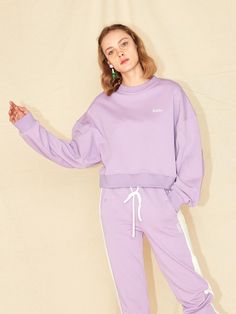 Composition : Exterior: 100% cotton Coloring: 100% cottonColor : PURPLE, LIGHT BEIGECountry of Origin : KOREA Spring Cotton Sweats In Athleisure Style, Purple Long Sleeve Athleisure Sweatshirt, Spring Cotton Tops With Ribbed Cuffs, Cotton Crew Sweats For Spring, Cotton Athleisure Sweater For Loungewear, Spring Cotton Athleisure Sweatshirt, Spring Cotton Crew Sweats, Sporty Cotton Sweatshirt For Spring, Purple Relaxed Fit Sweatshirt