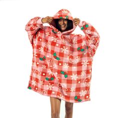 Celebrate the holidays with cozy style in this red plaid Hello Kitty Christmas hooded blanket. The design features a festive mix of holly, snowflakes, and Hello Kitty’s face in charming line art. Crafted from plush coral faux shearling back fabric, this blanket includes handy onseam pockets and measures 36” in body length with a 35” bottom opening width. Ideal for snuggling up, it’s machine washable on cold with like colors and can be tumble dried on low heat. Avoid ironing and dry cleaning to k Christmas Line Art, Shop Hello Kitty, Kitty Christmas, Plaid Hoodie, Oversized Blanket, Hello Kitty Christmas, Winter Plaid, Cozy Style, Hoodie Blanket