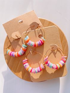 Rainbow hoop heishi bead earrings ✨ Add a pair of colorful hoop earrings to your outfit for a vibrant stylish look! These earrings are a great statement piece for everyday outfits and are easy to match. Include these earrings in your look or gift it to someone special 💞 Each pair of these earrings are unique and may vary in color because they are one of a kind. All pairs are based off the choices shown in the photos! At check out choose between silver or gold hoops! (Gold hoops are shown in the Heishi Bead Earrings, Heishi Earrings, Y2k Earrings, Jewelry Y2k, Pop Jewelry, 90s Jewelry, Festival Earrings, Hoops Gold, Rainbow Earrings