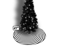 a black and white photo of a christmas tree with the number 477 on it