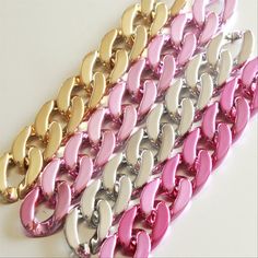 Metallic acrylic curb chain links, acrylic chain links,  open link. ※ Description ※ ♥ Size: per link 28mmx20mm, thickness of 6mm. ♥ Color: pls choose the color you want according the second picture. ♥ Qty: 40pcs separated links ♥ Useage: diy for bracelet, necklace or other craft items. ♥ Package: well poly bag and wrapped by package material to prevent breakage and wearout. ※ Shipping Time ※ *Shipping time: The delivery time is around 9-30 working days.Sometimes the arriving time is possibly pos Plastic Link Necklaces, Trendy Pink Chain Link Necklace, Pink Chunky Link Chain Jewelry, Pink Chunky Chain Link Jewelry, Trendy Pink Jewelry With Chain Strap, Bracelet Chain, Chain Links, Poly Bags, Curb Chain