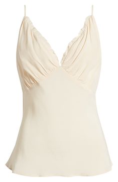 Subtle ruffles trim the neckline of this lightweight crepe camisole hung from slender, adjustable straps. 14" center front length (size Medium) V-neck Adjustable straps 58% rayon, 42% viscose Dry clean Imported Fitted V-neck Camisole With Ruffles, Feminine V-neck Camisole With Ruffles, Feminine Ruffled Camisole, Ruffled Camisole Tank Top For Daywear, Feminine Camisole With Adjustable Ruffled Straps, Chic Ruffled V-neck Camisole, Elegant Ruffled Straps Tank Top For Spring, Elegant Fitted Camisole With Ruffled Straps, Feminine V-neck Ruffled Camisole