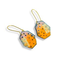 A burst of color! Imagine wearing these orange, pink, and pale green enamel earrings with just about anything. They have a fun bumpy texture.  These lightweight, unusual earrings come with high quality hand formed brass ear wires that clasp so you never have to worry about losing them. What is enamel?   Enamel is made by fusing multiple layers of glass to a prepared metal at a very high heat.  Each earring requires between four to 10 layers of enamel depending on the effect I'm going for.   To m Multicolor Enamel Jewelry With Ear Wire, Orange Enamel Earrings For Gifts, Orange Enamel Earrings As A Gift, Orange Enamel Earrings For Gift, Multicolor Enamel Earrings, Hand Painted Yellow Enamel Earrings, Artistic Yellow Jewelry With Matching Earrings, Artsy Orange Drop Earrings, Artisan Hand Painted Orange Jewelry