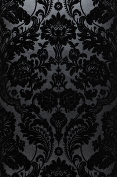 black and silver wallpaper with an ornate design