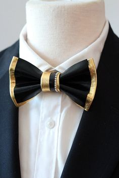 Check out this item in my Etsy shop https://www.etsy.com/listing/1217887302/black-and-gold-mens-custom-bow-tie-for Gold Bow Tie For Business, Gold Bow Tie For Formal Occasions, Classic Gold Bow Tie For Business, Gold Classic Bow Tie For Business, Adjustable Gold Bow Tie, Gold Dapper Bow Tie For Formal Occasions, Dapper Gold Bow Tie For Formal Occasions, Dapper Butterfly Knot Bow Tie For Black-tie Events, Elegant Gold Tuxedo For Party