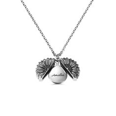 Introducing our Personalized Sunflower Locket Necklace, a stunning piece of jewelry that captures the beauty of nature and the warmth of personal memories. This exquisite necklace features a delicate locket adorned with a detailed sunflower design, symbolizing joy, adoration, and longevity. With the option to personalize the inside of the locket, this necklace becomes a cherished keepsake, perfect for holding meaningful messages close to your heart. Crafted with meticulous attention to detail, o Engraved Necklace Mothers, Loving Words, Silent Love, Hypoallergenic Necklace, Lucky Charm Necklace, Wedding Gifts For Groomsmen, Promise Rings For Couples, Mothers Bracelet, Sunflower Necklace