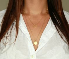 "Great Gift Idea This listing is for a 2 layered necklace and comes in 14K Gold Plated and Sterling Silver - The 2 pieces are separate, so you can mix and match and layer how you want. They even look amazing on their own.  Please note: our necklaces can be lengthened (with an extender) and shortened to any length. If you would like a custom length please let us know in the notes section of your order. The set of 2 includes: - Our Karma Circle Necklace at 18\" which can also be found here by itself:  https://www.etsy.com/listing/243149060/single-karma-circle-necklace-in-14k-gold?ref=shop_home_active_1 - Large Disc Necklace at 22\"  which can also be found here by itself:  https://www.etsy.com/listing/243038027/single-necklace-disc-pendant-large-on-22?ref=shop_home_active_6 Like picture 4? A Layered Gold Plated Necklaces As Gift, Layered Gold Plated Necklaces For Gifts, Layered Gold Plated Jewelry As Gift, Layered Gold-plated Necklace For Gifts, Layered Gold Plated Necklace For Gift, Layered Gold Plated Chain Necklace As Gift, Layered Gold Plated Chain Necklace Gift, Layered Yellow Gold Jewelry As Gift, Layered Yellow Gold Jewelry Gift