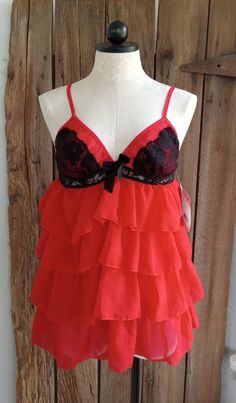 Coquette Camisole Nightgown For Party, Coquette Sleeveless Nightgown For Party, Red Coquette Style Sleepwear, Red Lace Trim Sleepwear For Night Out, Flirty Sheer Sleepwear For Parties, Flirty Party Sleepwear With Spaghetti Straps, Coquette Chemise For Bedtime, Red Coquette Camisole Sleepwear, Red Camisole For Party