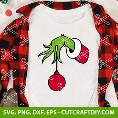 an image of a christmas shirt with the grin on it's head and boxing gloves