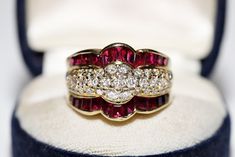 VINTAGE ORIGINAL 18K GOLD NATURAL DIAMOND AND RUBY DECORATED PRETTY STRONG RING In very good condition. Total weight is 13.4 grams. Totally is diamond  1.50 carat.. The diamond is has G color and vvs clarity. Totally is ruby 2 carat. Ring size is US 8  We can make any size. Please contact for any questions. Vintage Gold Ruby Ring With Vvs Clarity, 2 Carat Ring, Antique Diamond Rings, Ruby Stone, Antique Diamond, 2 Carat, Diamond Bands, Rings Statement, Natural Diamonds