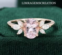 an engagement ring with a pink morganite surrounded by white diamonds