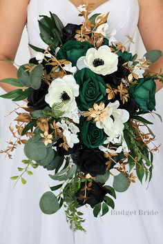 a bridal bouquet with white and black flowers