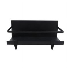 a black shelf with two shelves on each side and one shelf attached to the wall