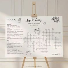 a crossword puzzle board on a easel with the words sip and slide written in it