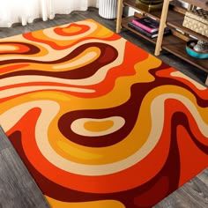 an orange, yellow and red rug in a living room