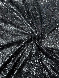 black and silver glitter fabric with white dots