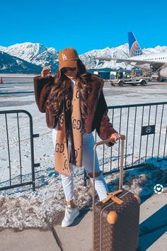 AIRPORT OUTFIT | Travel Fashion Look | Emily Ann Gemma, The Sweetest Thing Blog. LiKEtoKNOWit Outifts. LOS ANGELES DODGERS CARHARTT X '47 CLEAN UP, Gucci GG jacquard wool silk scarf, Big Time Faux Fur Jacket, Oversize Low Top Sneaker ALEXANDER MCQUEEN, FREE PEOPLE Tunic T-shirt, Panarea 60mm Aviator Sunglasses. Emily Ann Gemma, The Sweetest Thing Blog #EmilyGemma #theSweetestThingBlog Gucci Scarf Outfit, Wool Scarf Outfit, Chic Travel Outfit, Outfit Travel, Scarf Outfit