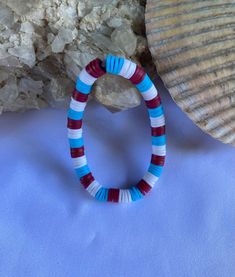 Patriotic Clay Beaded Bracelet Size: 5 inch wrist (for a smaller wrist) (stretchy elastic) Multicolor Beaded Wristband For Beach, Vacation Beaded Bracelets With Spacer Beads, Beaded Bangle Bracelets For Beach, Turquoise Stretch Bracelet With Large Beads For Beach, Stretch Bracelet With Large Beads For Beach, Hand-strung Beaded Bangle Bracelets For Beach, Multicolor Polished Beads Bracelets For Beach, Hand-strung Round Beads Wristband For Beach, Multicolor Polished Beads Bracelet For Beach