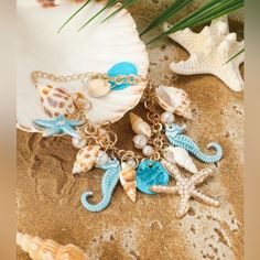 Summer Vacation Beach Jewelry Bracelet Ornate Of More Than 15 Charms Measures: Lenght 17cm +5cm Beach Ocean-inspired Charm Bracelet, Blue Charm Bracelets For The Beach, Bohemian Charm Bracelet For Beach With Lobster Clasp, Bohemian Charm Bracelet For The Beach, Surf Jewelry, Beachy Jewelry, Starfish Bracelet, Blue Shell, Ocean Jewelry