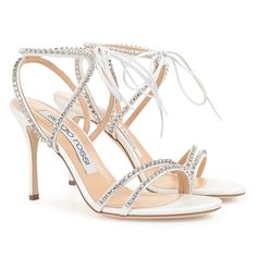 Sergio Rossi Godiva Bridal Satin And Crystal Sandal In White, Size 35.5. Brand New With Box And Dust Bags! 3.5” Heel Height. Retail $1,137. The Godiva Sandals Cast New Light On All-White Elegance Thanks To Their Precious Design With Sparkling Crystals. To Accentuate The Sophistication Of Your Looks, The Embellished Strap Wraps Elegantly Around The Ankle, Highlighting It With A Delicate Bow On The Front. A Mix Of Charm And Sensuality For A Shining Statement Of Style. * Fabric: Satin * Rhinestone Designer White Embellished Sandals, Designer Ankle Strap Sandals For Wedding, Luxury Leather Sandals For Wedding, Designer White Heels For Gala, White Leather Sandals For Gala, Designer White Sandals For Cocktail, Designer Wedding Sandals With Heel Strap, Designer White Sandals For Wedding, Designer White Wedding Sandals