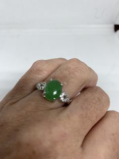 Vintage green nephrite jade Ornate German Silver ring, does not tarnish, NOT sterling Sizes 6.5, 7, 8 or 9 All rings are shipped in a nice gift box. Check out our over a THOUSAND great reviews Engraving is $4 per letter and is not always perfect depending on the piece. It can take a few days if the jeweler is busy. This is payable to Paypal Judithsltd@gmail.com Green Oval Crystal Ring With Prong Setting, Hallmarked Green Oval Diamond Ring, Classic Green Jade Rings, Green Jade Promise Ring, Oval Green Hallmarked Diamond Ring, Green Jade Rings For Promise, Green Jade Anniversary Rings, Oval Jade Rings For Anniversary, Oval Green Diamond Ring Hallmarked