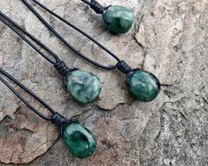 Beautiful handmade Emerald stone pendant, with an adjustable black necklace cord. Emerald, May's birthstone, is known as the love passion, and relationship crystal that can also bring prosperity, joy, hope, and emotional healing. This necklace is a unique creation that will shine out the uniqueness in you. It can be a great gift for your loved one or yourself! *'¨) ¸.*'¸.**'¨) ¸. (¸.*' (¸.*` ♥ *FREE INTERNATIONAL SHIPPING ►►You will receive one stone pendant chosen randomly from the lot. ►►As na Healing Waxed Cord Necklace With Adjustable Cord, Spiritual Crystal Necklace With Adjustable Waxed Cord, Spiritual Crystal Necklace On Waxed Cord As Gift, Green Waxed Cord Necklace For Gifts, Pendant Crystal Necklace With Adjustable Cord As Gift, Spiritual Crystal Necklace With Adjustable Cord As Gift, Spiritual Necklace With Sliding Knot As Gift, Spiritual Necklace With Sliding Knot For Gift, Emerald Jewelry Necklace