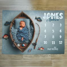 a baby is laying in a boat with fishing gear on the floor next to it