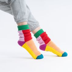 These unisex fleece-lined knit slipper socks are the best of both worlds! The easy fit of socks meets the plush comfort of house slippers. Our Kaleidoscope House Socks are knit with punchy fun colorblocking to keep you cozy (and bright) indoors. These soft knitted socks are fully lined with fluffy faux fleece for extra warmth. Slip-resistant patches on sole. Machine washable. Sizes S/M (Womens 6-9, Mens 5-7.5)L/XL (Womens 9.5-12.5, Mens 8-11) Details Body – 100% Soft AcrylicLining - Polyester Fl Knit Slipper Socks, House Socks, Spanish Shirts, Foot Socks, Soft Slippers, Quick Gifts, Knitted Socks, Knitted Slippers, Ux Web Design