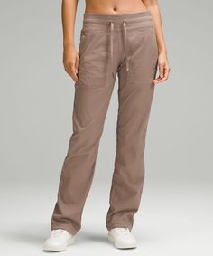 Easy, comfortable, and never clingy, these pants are in our after-practice hall of fame. Designed for Casual. Classic fit is an easy fit that floats away from your body:31.5" inseam, intended to sit below the ankle for heights of 5'5"-5'8". Waistband drawcord helps you customize the fit. Hand pockets with hidden pocket for small items. Hem drawcords let you adjust your look. Dance Studio Pants, Studio Pants, Quick Getaway, Lululemon Pants, Lightweight Pants, Lululemon Women, Dance Studio, Athletic Pants, Bottom Clothes