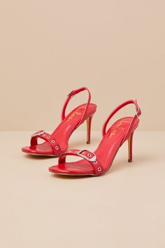 The Lulus Cleore Red Slingback Buckle High Heel Sandals are majorly iconic and will enhance any of your favorite OOTN! Crinkled faux leather shapes these too-stunning heels that feature a single sole silhouette, a rounded footbed, and a wide toe strap accented with silver grommets and a buckle-like detail. An adjustable, slender slingback strap secures with a dainty buckle, all atop a seriously sexy stiletto heel. 3. 5" stiletto heel. Cushioned insole. Rubber sole has nonskid markings. Man made Red Slingback Sandals With Buckle Closure For Summer, Chic Red Slingback Sandals With Ankle Strap, Summer Party Slingback Pumps With Adjustable Straps, Chic Red Slingback Pumps For Spring, Red Slingback Pumps With Ankle Strap For Summer, Red Ankle Strap Slingback Pumps For Summer, Red Slingback Pumps With Heel Strap For Summer, Chic Slingback Sandals With Buckle For Party, Chic Party Slingback Sandals With Buckle Closure