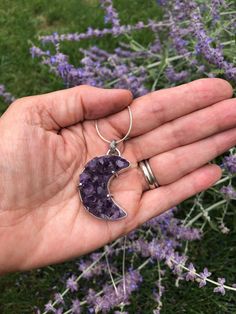 "Purple Raw Amethyst Moon Necklace, Purple Amethyst Moon Necklace, Purple Amethyst Crystal Moon, Crystal Healing Amethyst Necklace Crystal pendant is a gorgeous, yummy amethyst surrounded by a sterling bezel and secured by 3 prongs.  Pendant is 1 1/2\" long from top hoop to bottom of moon. View from side shows raw crystals approximately 3/8\" tall. Choice of 18\", 20\" or 24\" sterling snake chain. I hope you enjoy it! COME VISIT ME AT: https://www.facebook.com/Witt-N-Whimsy-331040443585943/?ref Spiritual Amethyst Necklace With Moon Charm, Handmade Celestial Amethyst Necklace, Celestial Amethyst Purple Necklace, Purple Moon Shaped Spiritual Jewelry, Spiritual Purple Necklace With Moon Charm, Celestial Purple Amethyst Necklace, Spiritual Purple Moon Shaped Jewelry, Spiritual Purple Moon-shaped Jewelry, Mystical Crescent Amethyst Jewelry