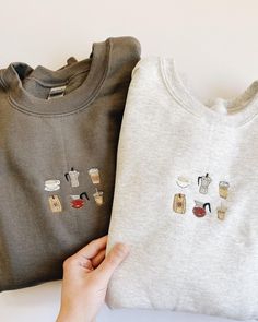 two sweaters that have been embroidered onto each other