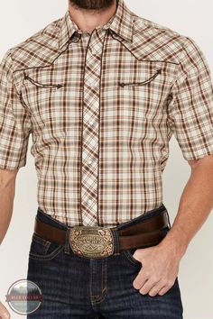 Roper 01-002-0016-3001 BR Embroidered Western Snap Short Sleeve Shirt Elevate your style with our Embroidered Western Snap Short Sleeve Shirt by Roper! Made from a blend of 55% cotton and 45% polyester, this shirt boasts a spread collar and pearl snap placket for a classic look. Featuring western yokes with guitar and rope embroidery on the back, two smile chest pockets, and a brown, black, and cream plaid print, you'll make a statement wherever you go. Comfort and style in one! 55% Cotton/ 45% Western Style Brown Collared Top, Western Brown Collared Tops, Fitted Brown Shirt For Rodeo, Fitted Brown Western Shirt, Brown Fitted Western Shirt, Fitted Western Brown Shirt, Brown Collared Western Shirt, Fitted Brown Short Sleeve Casual Shirt, Casual Brown Fitted Short Sleeve Shirt