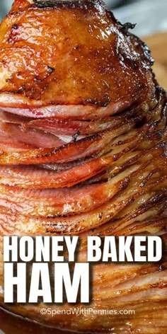 ham stacked on top of each other with the words honey baked ham written above it