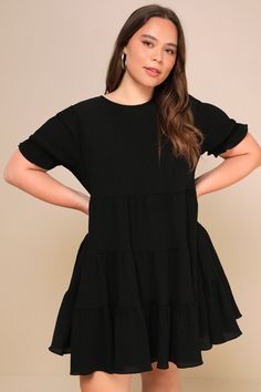 Make any day the best day ever with the Lulus Favorite Day Black Puff Sleeve Tiered Mini Dress! Lightweight crinkly woven fabric shapes this dress that has a crew neckline, puffy short sleeves with elastic ruffle cuffs, and a relaxed bodice. The swingy skirt is accented with rows of tiers before ending at a mini hem. Keyhole opening and button closure at back. Fit: This garment fits true to size. Length: Mid-thigh. Size medium measures 33.75" from shoulder to hem. Bust: Works best for A to C cup Tiered Mini Dress, Cup Sizes, Comfortable Room, The Best Day, Womens Black Dress, Best Day Ever, Full Skirt, Crew Neckline, Woven Fabric