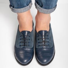 Remixed in soft navy leather and ribbed corduroy textile, this iconic oxfords seamlessly blend traditional design with contemporary flair. Featuring the low heel for all-day comfort and eye-catching brogues for added detail, these shoes are a stylish and versatile addition to your wardrobe. Upper & lining: leather and textile Closure: lace-up Fit: true to size or slightly bigger Width: available in regular (B)  Sole: synthetic, slip resistant Heel: 2.5 cm / 1.0" Footbed is not removable -------- Slip-on Low-top Leather Shoes With Brogue Detailing, Slip-on Brogue Leather Low-top Shoes, Leather Oxford Shoes With Rubber Sole And Round Toe, Oxford Leather Shoes With Textured Sole And Cap Toe, Slip-on Wingtip Oxfords With Textured Sole, Slip-on Oxfords With Brogue Detailing And Cap Toe, Classic Slip-on Low-top Oxfords, Slip-on Cap Toe Oxfords With Rubber Sole, Blue Oxford Leather Shoes With Plain Toe