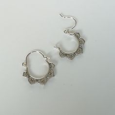 A PAIR of indian style sterling silver ear hoops. Size: 18 x 20 mm Price listed is for a pair of ear hoops. These earrings are made of 925 hypoallergenic sterling silver. All my pieces are sent in a gift box. I can include a personal message from you if needed. You are welcome to contact me at... bhavnakwintra1956@gmail.com More hoops: https://www.etsy.com/your/shops/TheSilverGame/tools/listings/section:26305414 More earrings: https://www.etsy.com/your/shops/TheSilverGame/tools/listings/section: Traditional Small Hoop Earrings Nickel Free, Traditional Small Hoop Nickel-free Earrings, Nickel-free Small Hoop Traditional Earrings, Small Hoop Earrings For Festival, Bohemian Small Hoop Single Cartilage Earring, Bohemian Small Hoop Cartilage Earrings, Small Hoop Single Earring For Festival, Nickel-free Small Hoop Bohemian Cartilage Earrings, Nickel-free Bohemian Small Hoop Cartilage Earrings