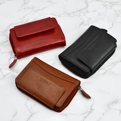 Introducing the Giovanna Women's Italian Leather Bi-fold Wallet, complete with a convenient zippered coin pocket, buttery-soft Italian Leather, and a snap closure. Keep your essentials organized and secure with RFID lining. Closed measurement: 5.5" x 3.5" Zippered Coin Pocket 14 card slots Eco-Friendly Vegetable Tanned Top Grain Leather RFID lining to help protect your credit and debit cards from unwarranted scanning. Beautifully Gift Boxed Made in Florence, Italy Luxury Classic Trifold Wallet For Evening, Luxury Saffiano Leather Modern Wallets, Luxury Saffiano Leather Wallet For Everyday Use, Classic Compact Wallet For Daily Use, Classic Bifold Wallet With Removable Pouch, Classic Compact Wallet For Everyday Use, Compact Wallets With Rfid Blocking For Daily Use, Compact Trifold Wallet With Card Slots For Everyday, Modern Trifold Wallet For Business