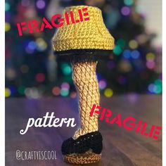 there is a knitted foot with a hat on it and the words fragile written in red