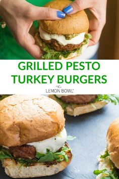 grilled pesto turkey burgers with lemon bowl sauce on the side and hands holding one