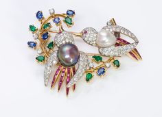 Gemstone Diamond Pearl Bird Gold Brooch.Vintage multi colored gemstone calibre ruby, emerald, sapphire, diamond and two color pearl bird brooch. Elegant Multicolor Gemstone Brooches, Elegant Multicolor Brooches For Evening, Elegant Multicolor Brooches For Formal Occasions, Emerald Brooch, David Webb, Gold Brooch, Ruby Emerald, Jewelry Boards, Calcium Carbonate