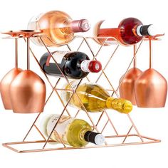 the wine rack is holding several bottles of wine