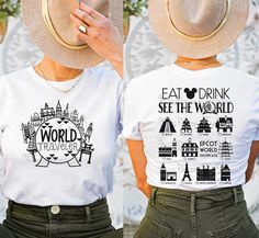 two women wearing t - shirts that say eat drink see the world and have hats on their heads